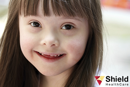Smiling girl with Down Syndrome