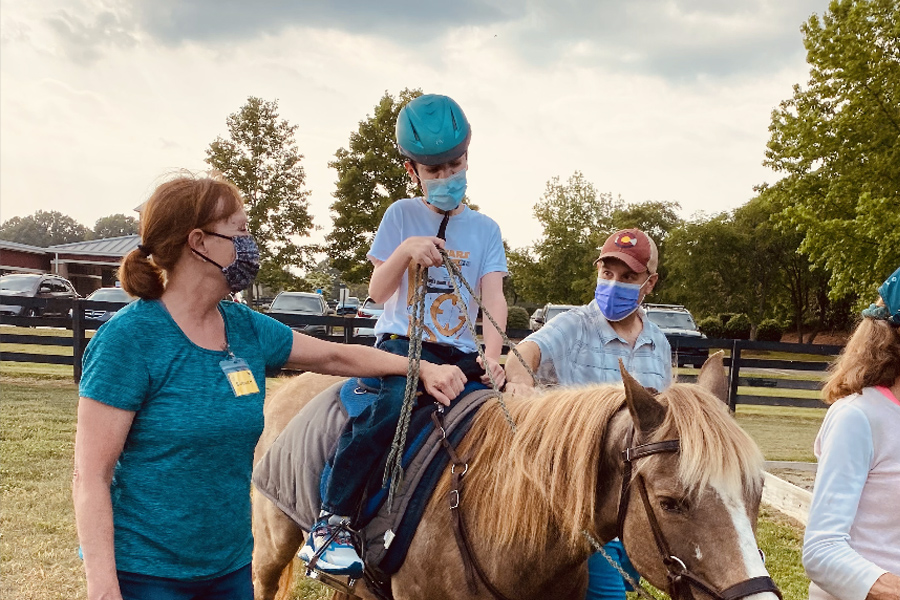 Charlie horseback riding